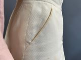 a close up of a woman ' s pants with a zipper