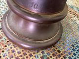 a close up view of a vase on a table