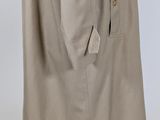 a beige trench coat on a mannequin mannequin mannequin mannequin mannequin mannequin mannequin mannequin manne