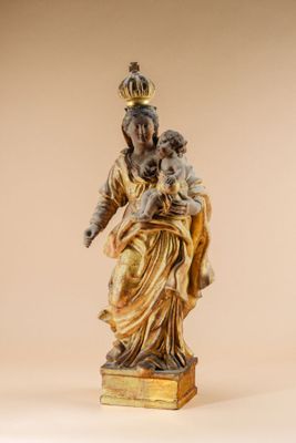 an image of a statue of a woman holding a child