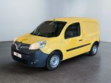 La camionnette jaune est garée dans la pièce vide de l'immeuble.