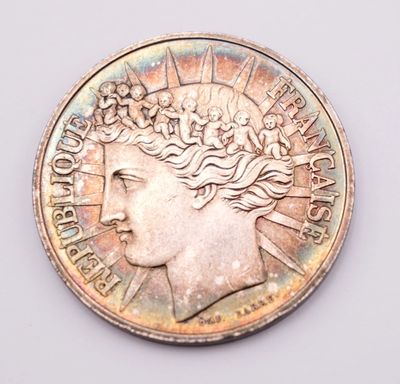 an image of a close up of a coin on a white surface