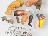 many different types of animal figurines arranged in a circle