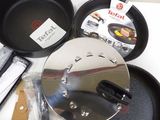 many pans and pans sitting on a table