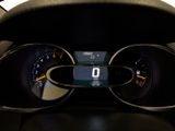 the dashboard of a car with a digital display on it