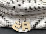 a purse that has a tag that says r5 on it