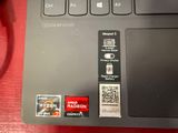 a close up of a laptop with a qr code on the keyboard
