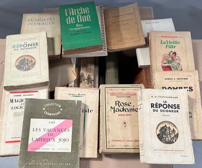 a lot of books that are sitting on a table