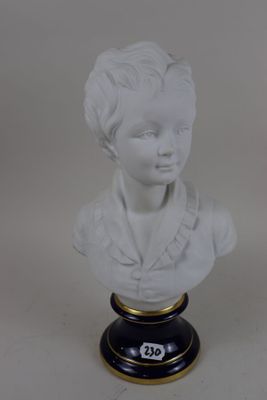 white marble bust of a young boy on a black and gold base