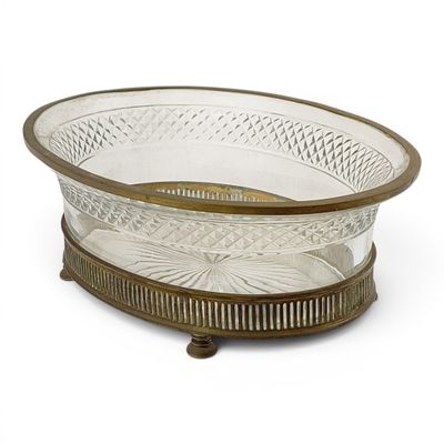an image of a glass bowl on a stand on a white background
