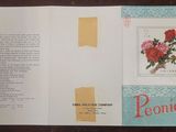 un livre ouvert sur lequel figure l'image d'une fleur