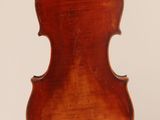 an old violin with a wooden back and a long neck