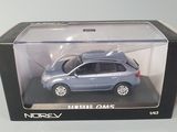 a toy car that is in a box on a table