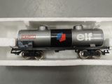 a toy train with a tank on the side of it