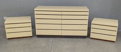 four pieces of furniture are arranged in a row on the floor
