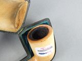 a pipe that is sitting in a case on the ground