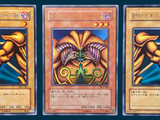 three cards with different designs on them on a blue background