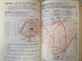 an open book with a map of a city on it