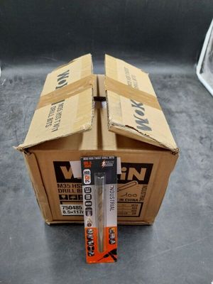 a cardboard box that has a pair of scissors in it