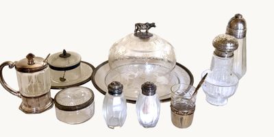 a lot of glass items that are sitting on a table