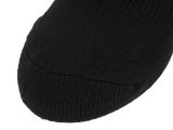 black knitted slippers on a white background on a white surface