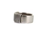 a close up of a ring on a white background