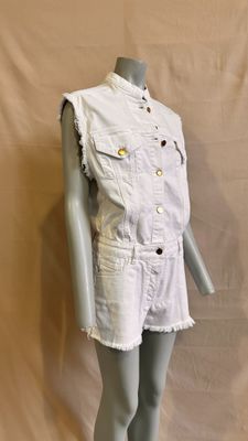 an image of a mannequin wearing a white shirt and shorts
