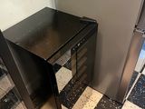 an image of a kitchen with a black and white checkered floor