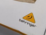 a box that has a sign on it that says behinger