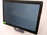 a tablet computer sitting on top of a table