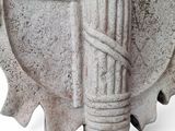 a statue of a man with a sword on a white background