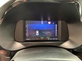 a digital display on the dashboard of a car