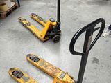 two pallets that are sitting on the floor in a warehouse