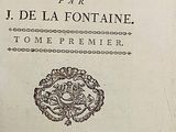 an old book that has a picture of a bird on it