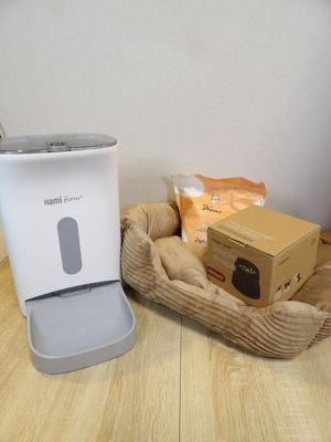a coffee maker and a box sitting on a table