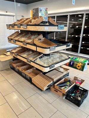a large display of different types of food in a store