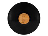 a black vinyl record on a white surface with a white background