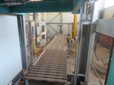 a picture of a conveyor belt in a factory