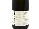 a bottle of wine that is sitting on a table