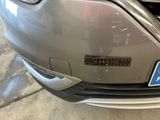 a close up of a car ' s bumper with a sticker on it