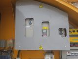 a machine that is sitting inside of a building