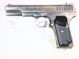 a gun that is sitting on a table