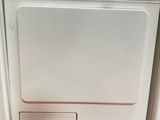 a white washer and dryer sitting next to each other
