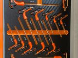 a box with a bunch of wrenches in it