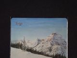 a picture of a painting of a snow covered mountain