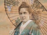 painting of a woman in a kimono with a parasol