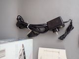 a box with a charger and a charger on it