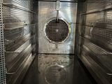 an image of a stainless steel oven with the door open