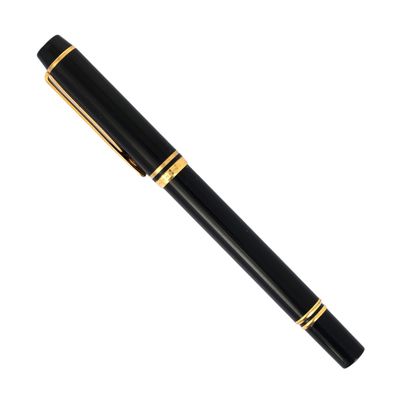 un stylo noir et doré avec une finition dorée