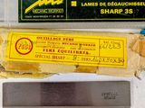 a piece of cheese on the counter next to a sharp knife